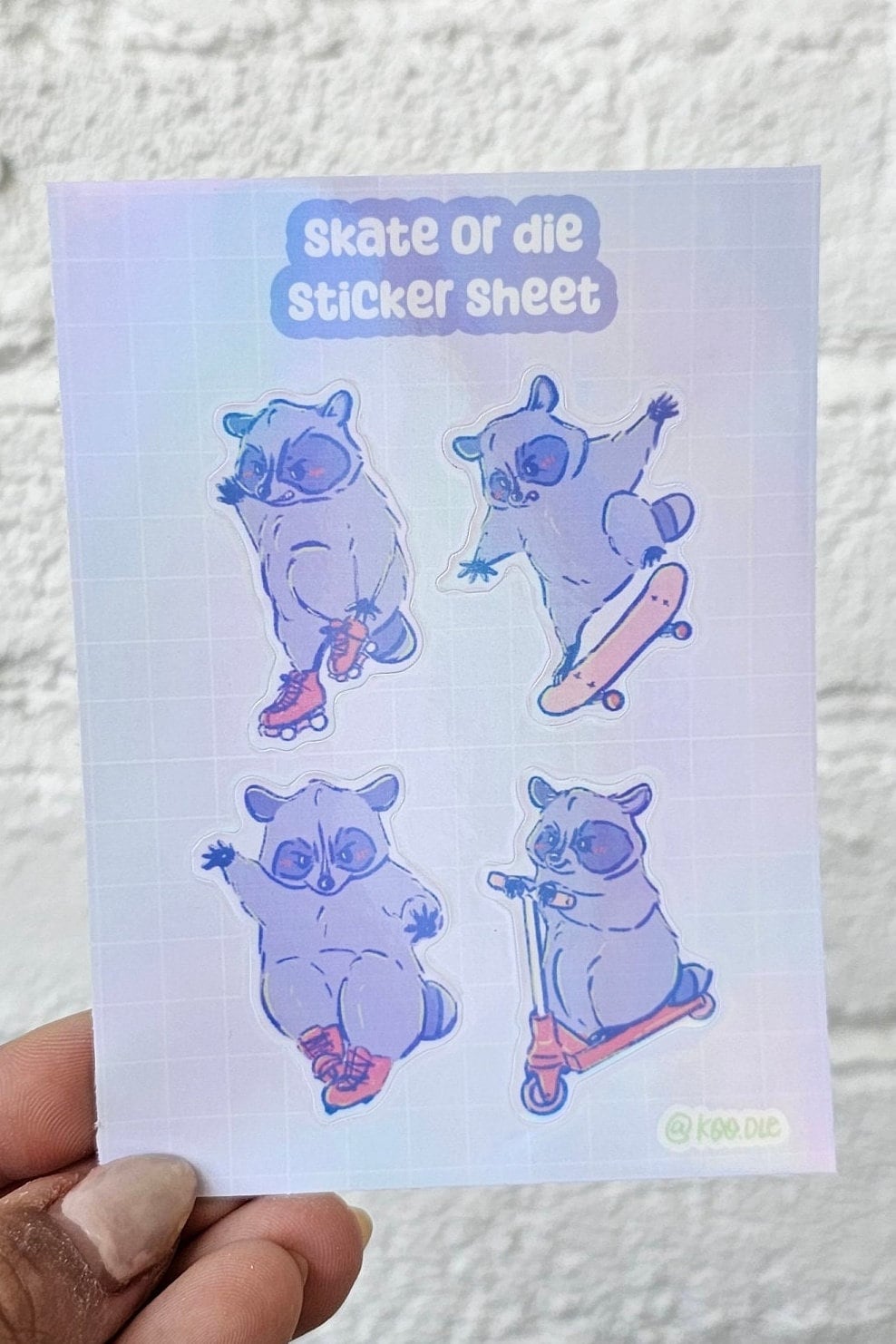 Skate Or Die Holographic Skateboarding, Rollerskating, Rollerblading, and Scooter riding Raccoon Sticker Sheet - Koodle