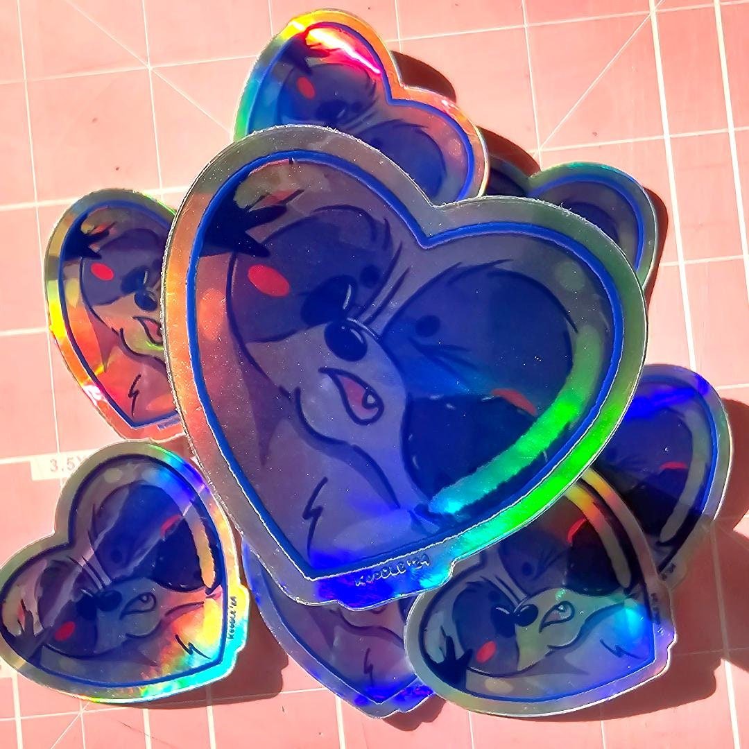 Cute Raccoon Squished Against Heart - Shaped Window Holographic Sticker - Koodle