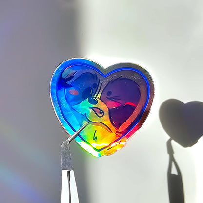 Cute Raccoon Squished Against Heart - Shaped Window Holographic Sticker - Koodle