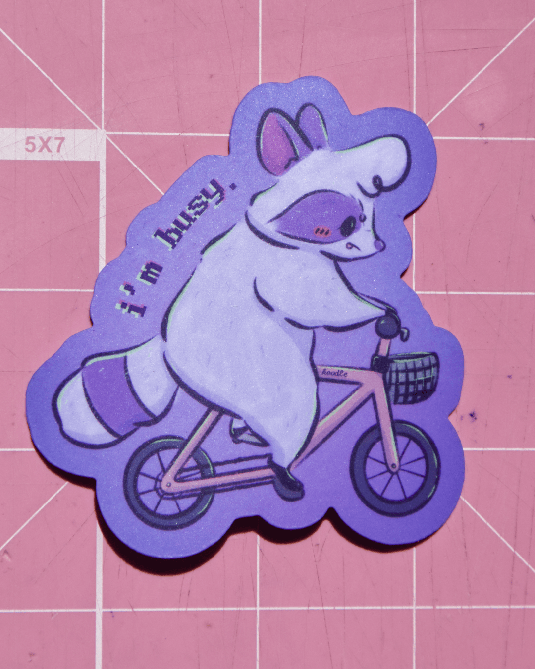 I'm Busy: Raccoon Riding A Bicycle Sticker - Koodle